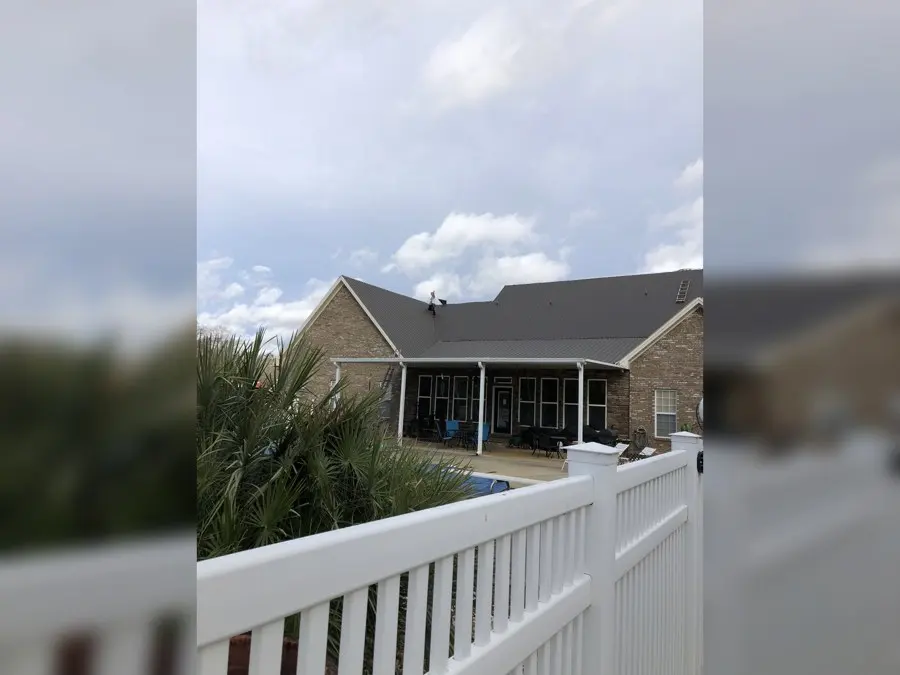 Blue metal roof on a barn-style building