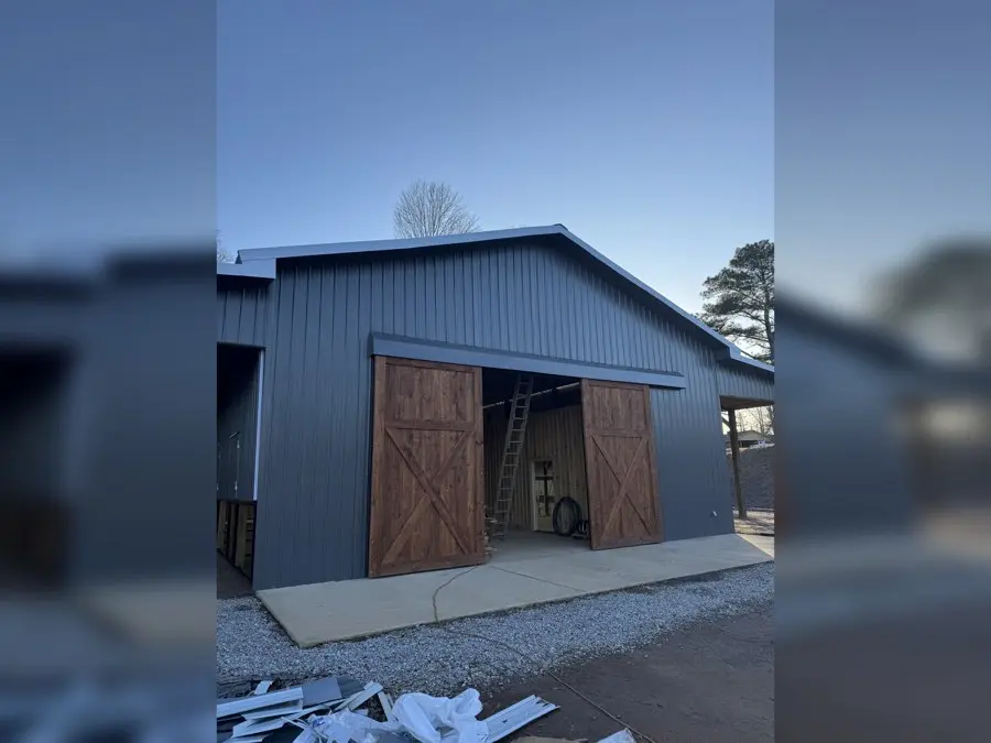 Metal roof panels installed over a roof deck
